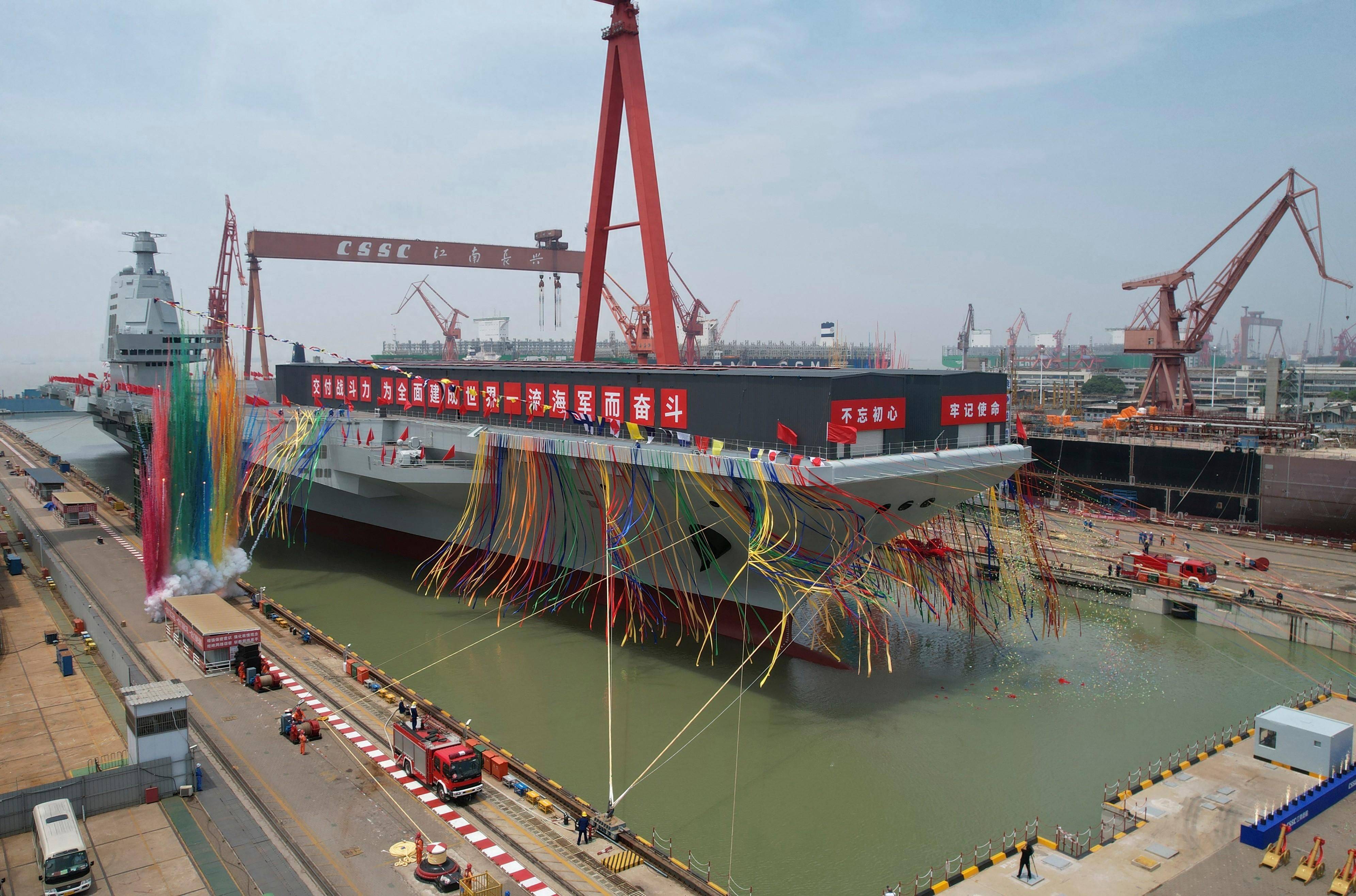 解放軍確認(rèn)建造完成第四艘航母，展現(xiàn)國家力量與海洋雄心，解放軍完成第四艘航母建造，彰顯國家海洋雄心與力量